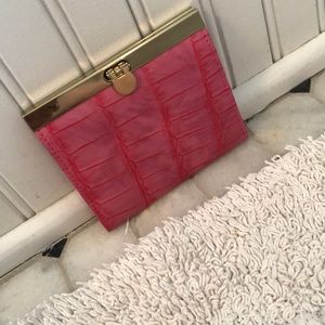 Hot pink leather three pocket clasp wallet